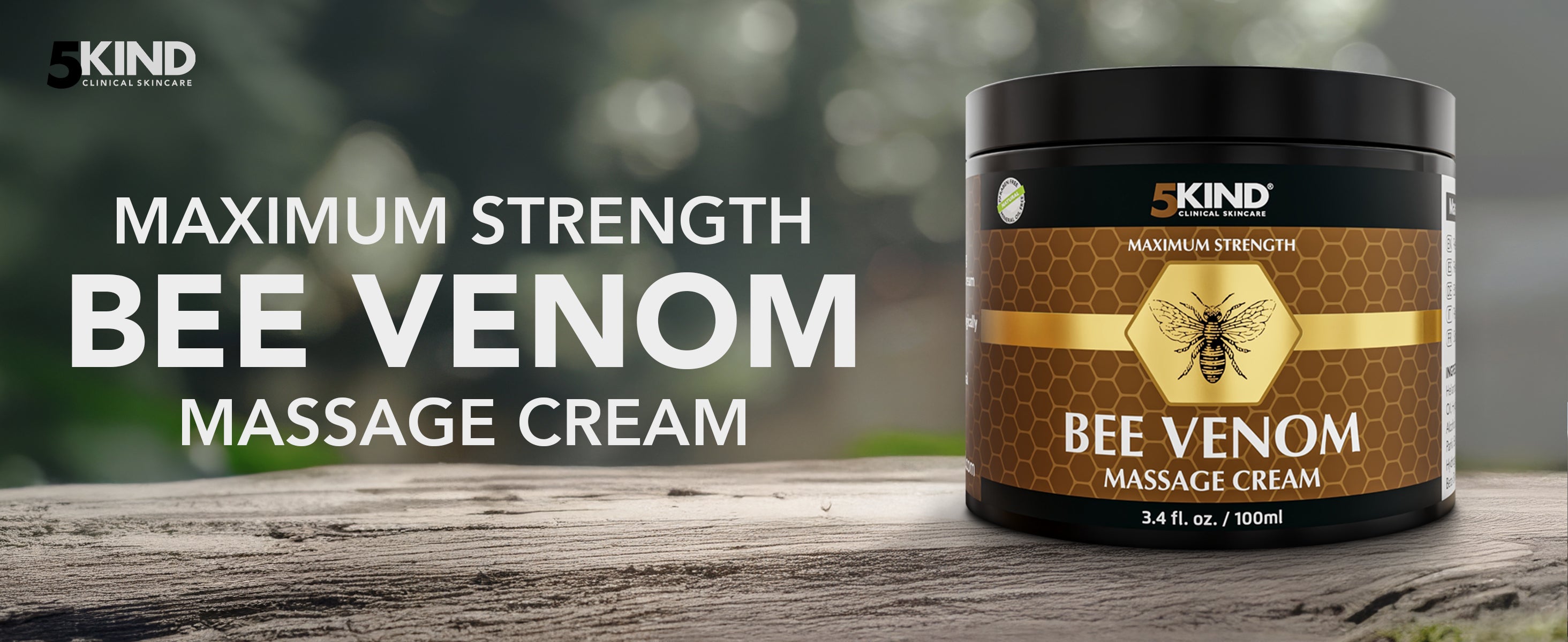 5Kind Bee Venom Massage Cream container on a wooden surface with a blurred natural background