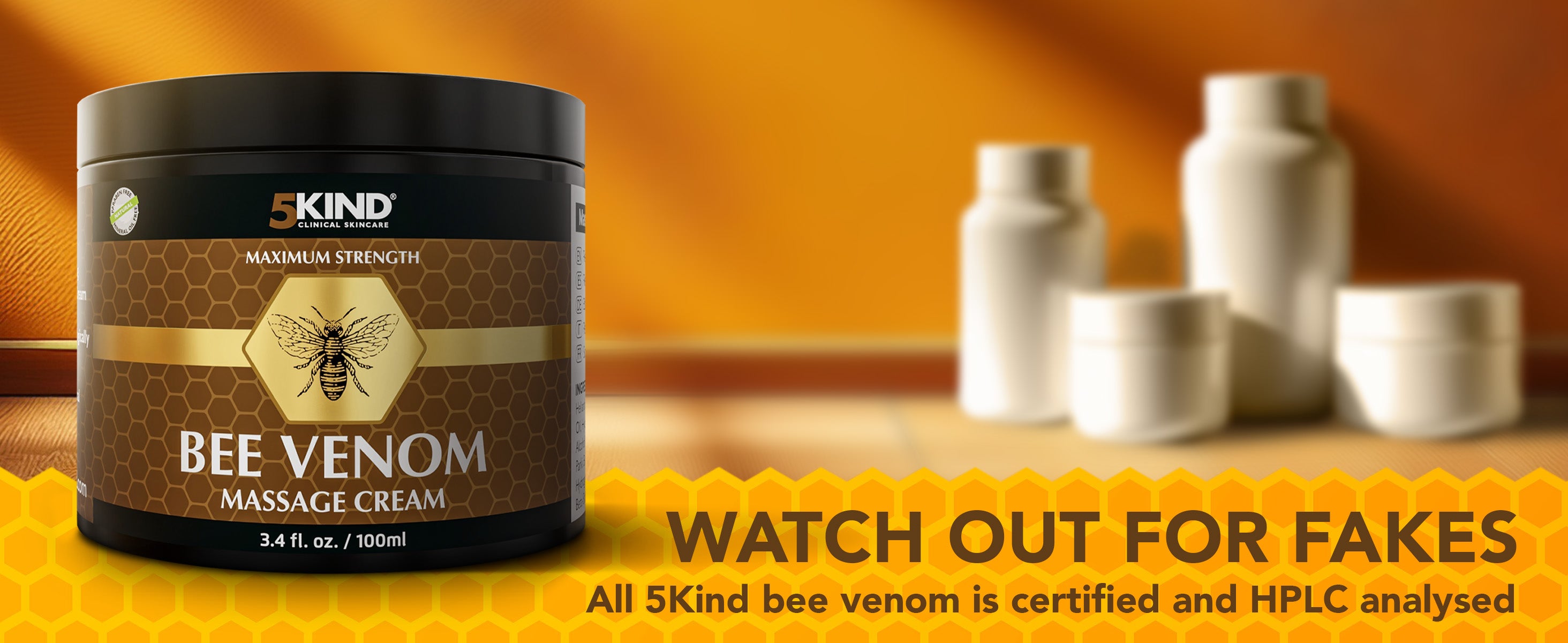 5Kind Bee Venom Massage Cream container with bottles on a warm gradient background